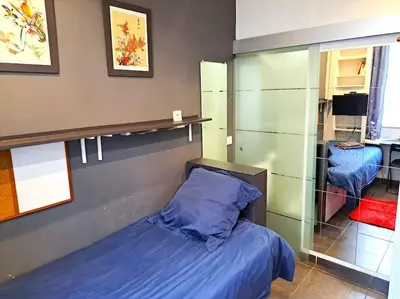 Un ou plusieurs lits dans un hébergement de l'établissement Studette Chabaud Rue