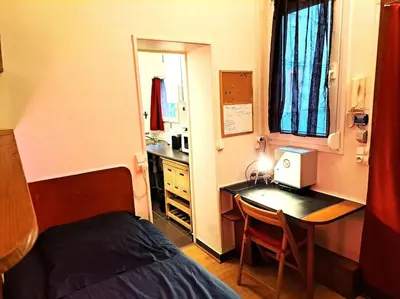 Un ou plusieurs lits dans un hébergement de l'établissement Studette Chabaud Cour