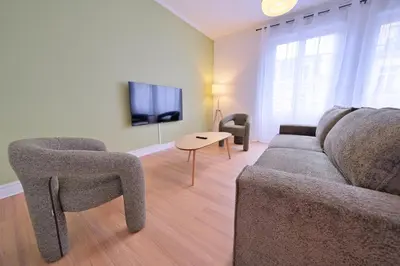 Télévision ou salle de divertissement dans l'établissement L'Ange au Sourire - Cathédrale - 3 appartements