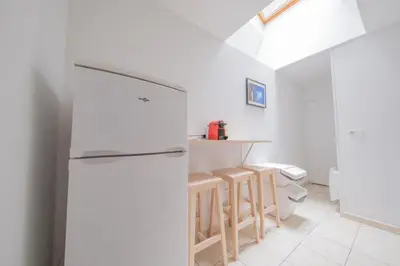 Cuisine ou kitchenette dans l'établissement L'Ange au Sourire - Cathédrale - 3 appartements