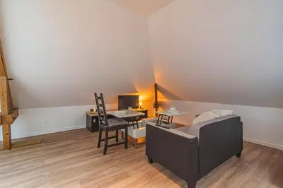Coin salon dans l'établissement Le cocon, studio pour 2 personnes