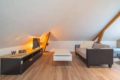 Coin salon dans l'établissement Le cocon, studio pour 2 personnes