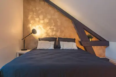 Un ou plusieurs lits dans un hébergement de l'établissement L'Azur doré, studio pour 2 voyageurs