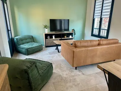 Coin salon dans l'établissement Gîte La Villa Marcelle
