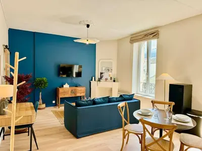 Coin salon dans l'établissement Relax Inn Champagne - Reims Balnéo