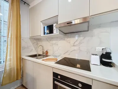 Cuisine ou kitchenette dans l'établissement Le Vendangeoir