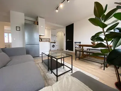 Cuisine ou kitchenette dans l'établissement Grand appartement Standing reims centre Arena