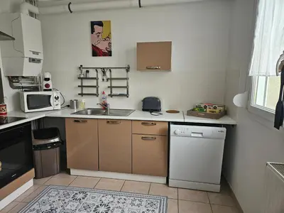 Cuisine ou kitchenette dans l'établissement Les Bulles au Féminin