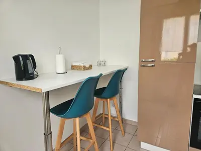 Cuisine ou kitchenette dans l'établissement Les Bulles au Féminin