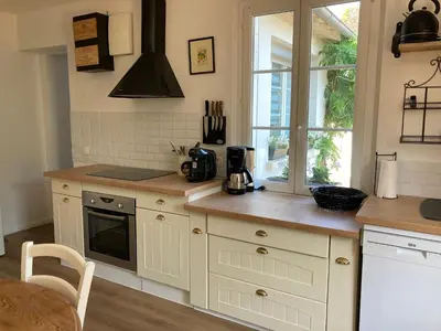 Cuisine ou kitchenette dans l'établissement Gite Les 3M
