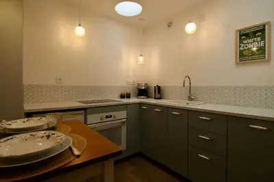 Cuisine ou kitchenette dans l'établissement Le Rétro de la Gare - FloBNB
