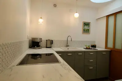 Cuisine ou kitchenette dans l'établissement Le Rétro de la Gare - FloBNB