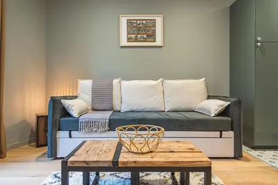 Coin salon dans l'établissement Millésime Duplex, Centre de Reims