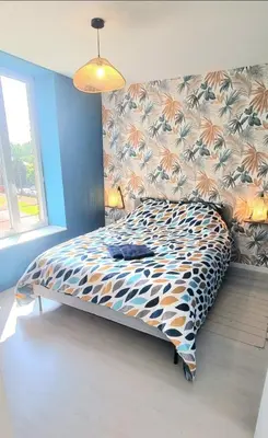 Un ou plusieurs lits dans un hébergement de l'établissement New appartement nature cœur de ville