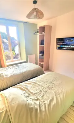 Un ou plusieurs lits dans un hébergement de l'établissement New appartement nature cœur de ville