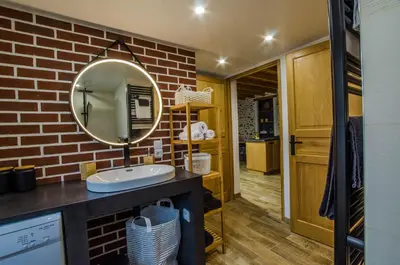 Salle de bains dans l'établissement Le Petit Candie