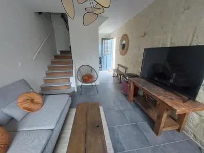 Télévision ou salle de divertissement dans l'établissement Mon Caillou