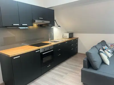 Cuisine ou kitchenette dans l'établissement Cœur des Moissons, Centre Ville avec Parking Privé