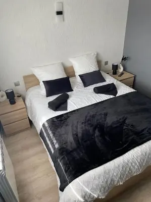 Un ou plusieurs lits dans un hébergement de l'établissement Maison d'hôtes