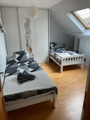 Un ou plusieurs lits dans un hébergement de l'établissement Maison d'hôtes