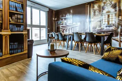 Coin salon dans l'établissement Le Gatsby à 20 mn de Disney