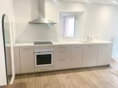 Cuisine ou kitchenette dans l'établissement La BULLE du 235