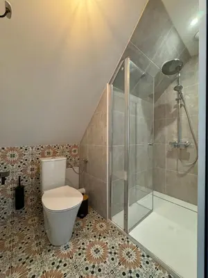 Salle de bains dans l'établissement Domaine Le Petit Moulin