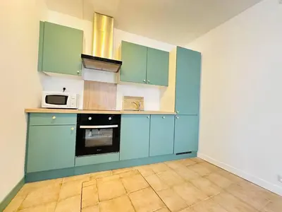 Cuisine ou kitchenette dans l'établissement Laon'Vert