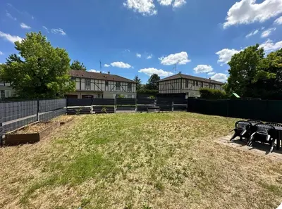 Jardin de l'établissement Charmante maison comme chez soi