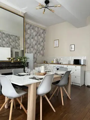Cuisine ou kitchenette dans l'établissement La Salle d Attente - Hyper centre