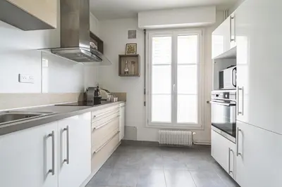 Cuisine ou kitchenette dans l'établissement Le Tambour Appartement Lumineux au Centre de Reims