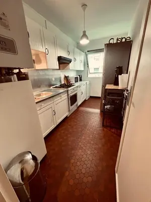 Cuisine ou kitchenette dans l'établissement Disney-Bord de Marne-Parking Privé