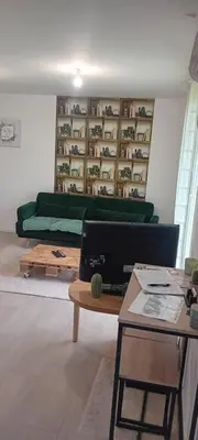 Coin salon dans l'établissement Appartement à la campagne