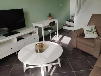 Télévision ou salle de divertissement dans l'établissement Le Pré Ducrot