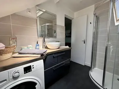 Salle de bains dans l'établissement La Loge et La Pause Compiègnoise
