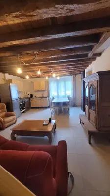 Coin salon dans l'établissement La Mélodie des champs, appartement mitoyen de 80 m2 dans une maison avec un autre appartement