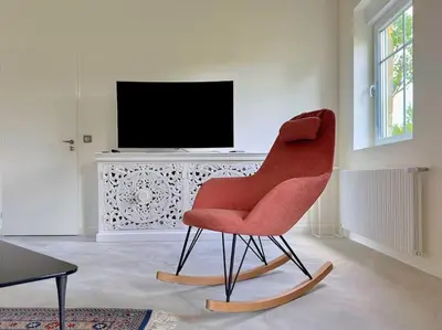 Télévision ou salle de divertissement dans l'établissement Le Moulin de Beaumanoir