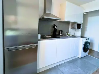 Cuisine ou kitchenette dans l'établissement SQ Appartement - 2 Chambres - Proche Gare - Wi-Fi