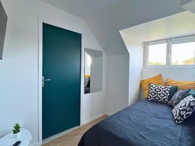Un ou plusieurs lits dans un hébergement de l'établissement SQ Appart City - 1 Chambre - 5 Pers