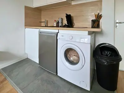 Cuisine ou kitchenette dans l'établissement SQ Appart City - 1 Chambre - 5 Pers
