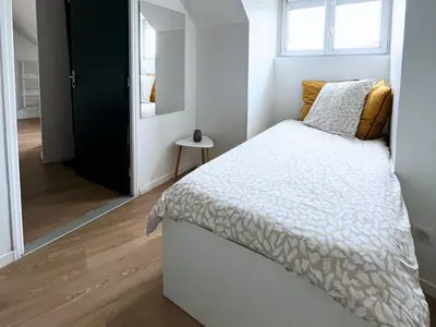 Un ou plusieurs lits dans un hébergement de l'établissement SQ Appart City - 1 Chambre - 5 Pers