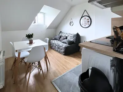 Coin salon dans l'établissement SQ Appart City - 1 Chambre - 5 Pers