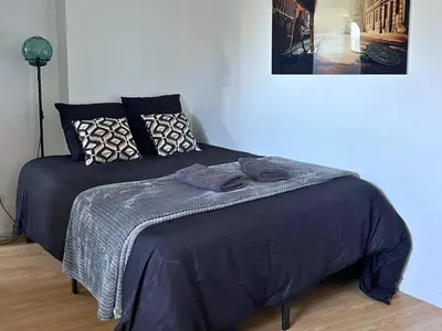 Un ou plusieurs lits dans un hébergement de l'établissement SQ Appart City - 1 Chambre - 5 Pers
