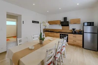 Cuisine ou kitchenette dans l'établissement La Maissemiacoise - Belle Maison de campagne