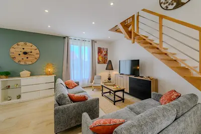 Coin salon dans l'établissement La Maissemiacoise - Belle Maison de campagne