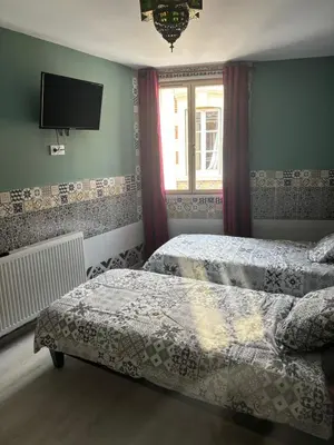 Un ou plusieurs lits dans un hébergement de l'établissement Chambre d hôtes Arcis sur Aube