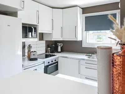 Cuisine ou kitchenette dans l'établissement Le Horance Balcon et parking