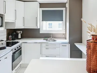 Cuisine ou kitchenette dans l'établissement Le Horance Balcon et parking