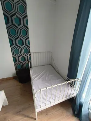 Un ou plusieurs lits dans un hébergement de l'établissement Maison 4 chambres proche Reims