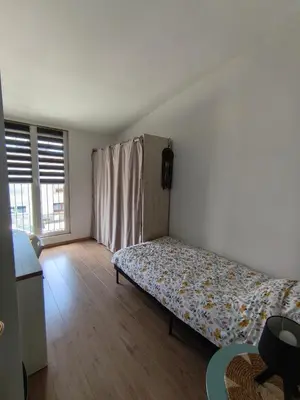 Un ou plusieurs lits dans un hébergement de l'établissement Maison 4 chambres proche Reims